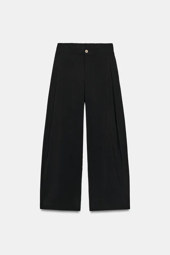 Model height: 178 cmHigh-waist trousers with front darts and an elasticated waistband at the back... | Zara US