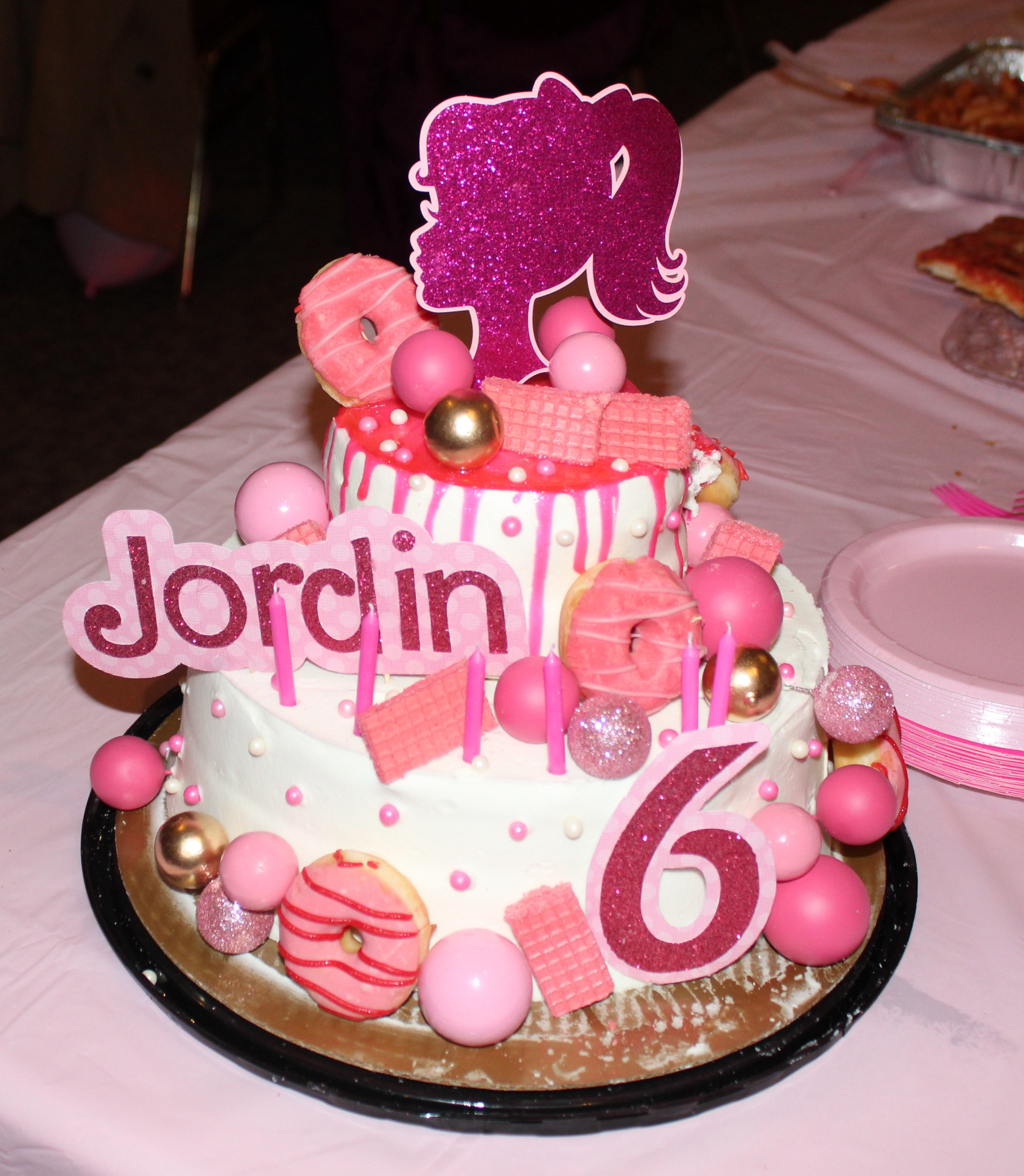 Barbie birthday cake! Got two plain white round cakes at BJs and stacked and decorated them!

#LTKparties