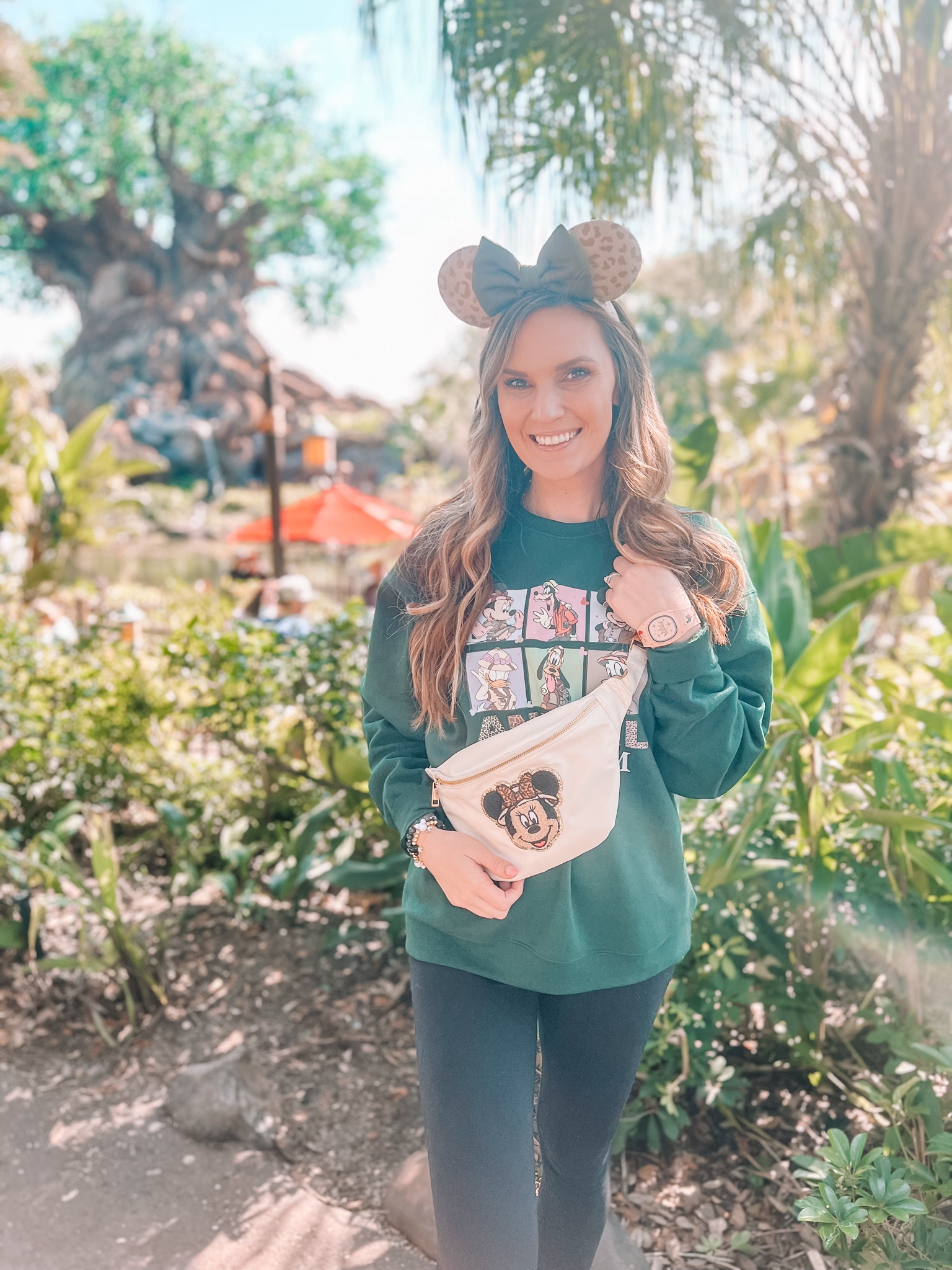 Cute and comfortable outfit for Animal Kingdom! It was so cold when we visited this month and this crew neck with Mickey, Minnie and friends in their safari outfits was perfect! Paired with the safari Minnie Fanny pack and neutral leopard ears, I loved this look! Perfect for a comfy and chilly day at the parks✨

#LTKtravel #LTKSeasonal #LTKfindsunder100