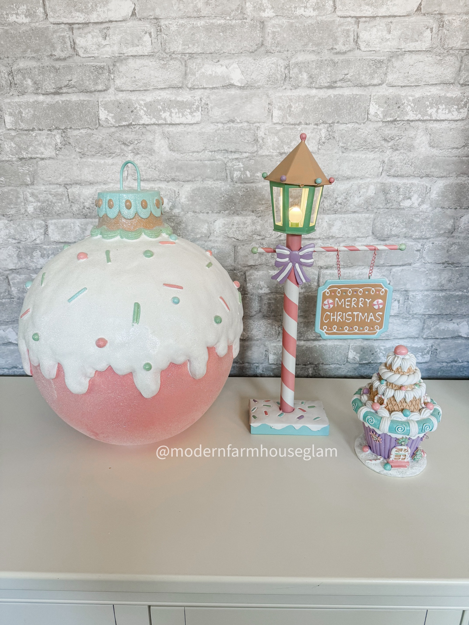 Just dropped Christmas home decor! Snag the good stuff early before it sells out! I was so excited to get these delivered today, especially the giant ornament with icing and sprinkles! I’m obsessed. 

Pastel Christmas pink gingerbread house cupcake  at home store 

#LTKSeasonal #LTKHome