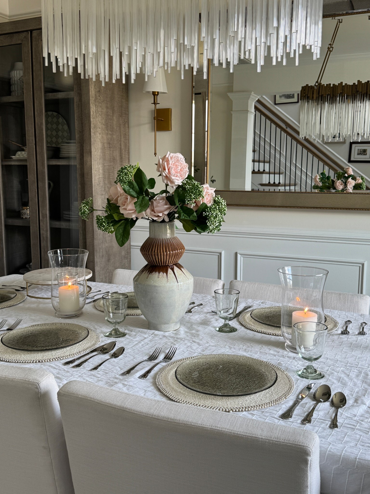 Cannot get over the dining room spring tablescape!

Faux flowers, case, placemats, plates, cabinet, mirror, light fixture

#LTKHome #LTKMothersDay #LTKSeasonal