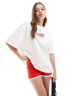 ASOS DESIGN boyfriend fit t-shirt with texas wild west graphic in cream | ASOS | ASOS (Global)