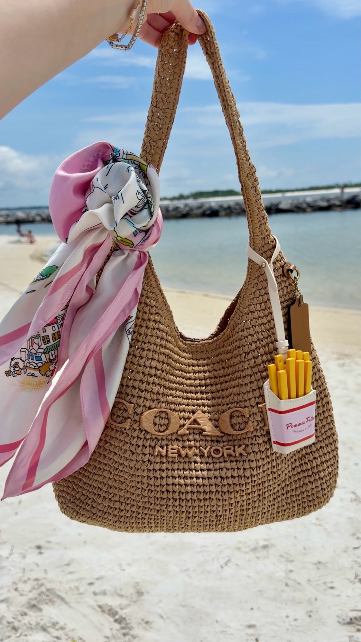 Soaking up the last lil bit of summer 
Bag of the day

Straw Coach Brooklyn 28
Longchamp summer scarf in pink
Kate spade French fry bag charm