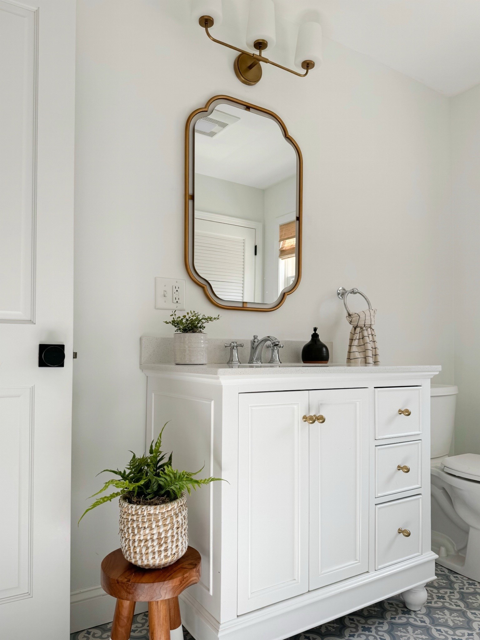Bathroom details that prove this space doesn’t have to be boring! ✨ Linking a similar mirror to this one, along with our vanity, a great stool for a corner, and our bath towels and accessories. 

#LTKHome #LTKSaleAlert