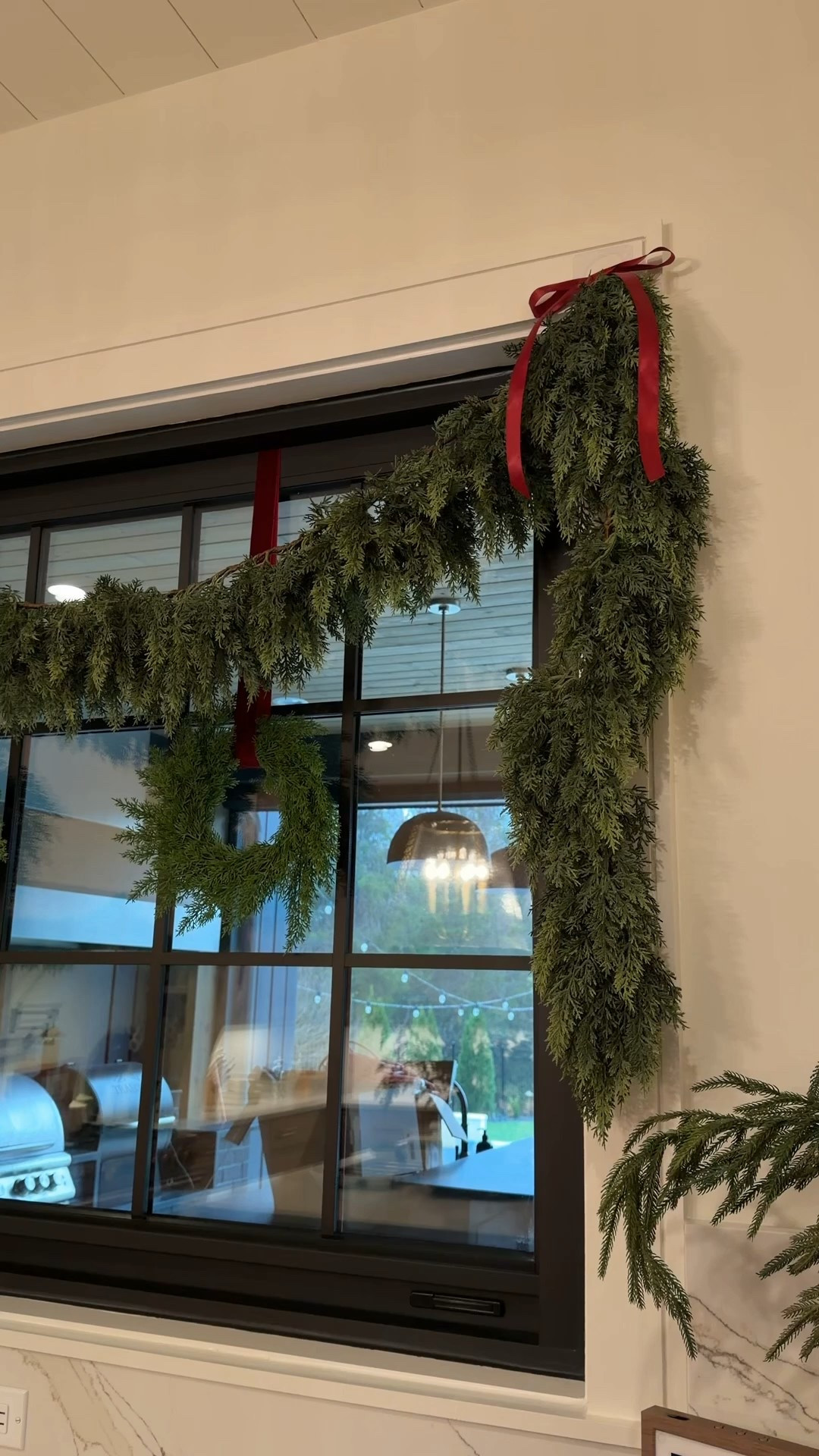 Can’t stop with this garland- top holiday find this year! Added some to this window & our kitchen hood + some red ribbon for a festive touch. So thick & it drapes beautifully!! Great price point for such amazing quality 🙌🏻 

#LTKHoliday #LTKFindsUnder100 #LTKHome