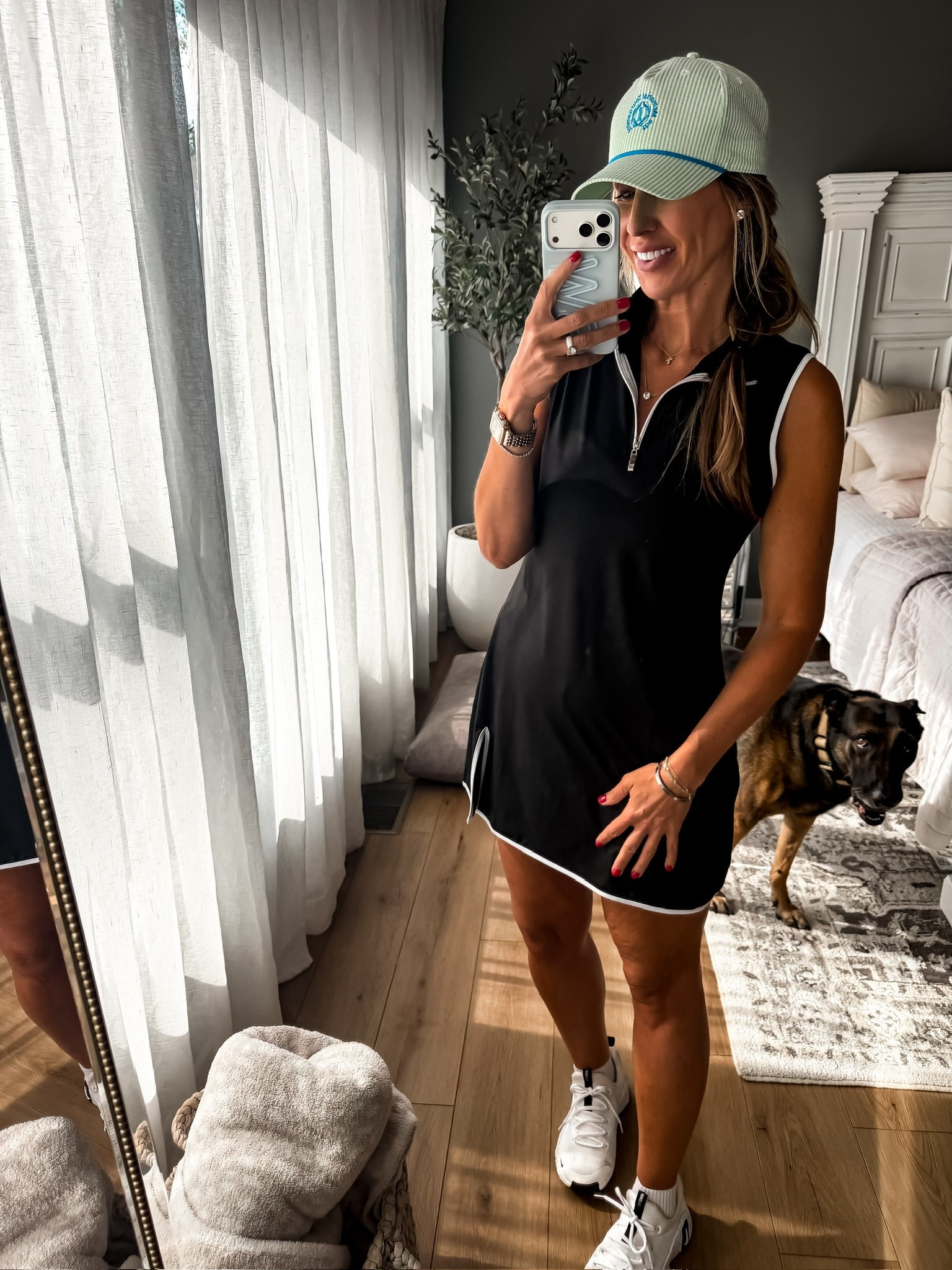 This sporty little dress is one of those pieces that makes getting dressed so easy. The smooth performance fabric is lightweight, breathable, and has enough stretch to move with you whether you’re heading to the tennis courts, running errands, or grabbing lunch. I love the contrast piping and half zip detail because they give it a polished, athletic look, and it already has built in shorts underneath so you don’t have to think twice before wearing it.

athletic dress, active dress, tennis dress, built in shorts, sporty style, athleisure outfit, everyday activewear, black athletic dress, casual summer outfit, themominstyle

#LTKOver40 #LTKSeasonal #LTKootd