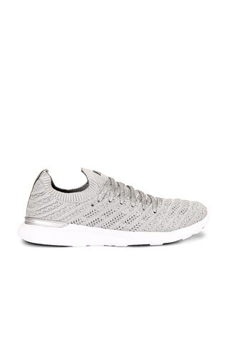 APL: Athletic Propulsion Labs TechLoom Wave Sneaker in Metallic Silver, White, & Black from Revol... | Revolve Clothing (Global)