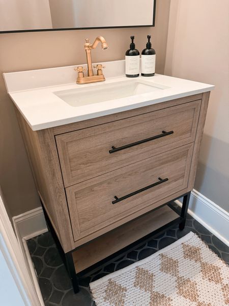 Half bath vanity from Home Depot — 🤎 perfect for this space! Comes in a few sizes! I have the 30” 👏🏼 & the faucet is Amazon! I love the mix of tones & metals in this bathroom so far. It’s so cozy!

Home decor / neutrals / bathroom decor / Holley Gabrielle 

#LTKhome #LTKstyletip