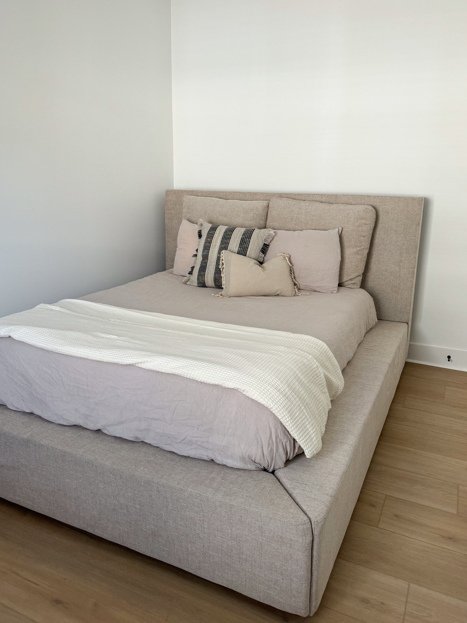 my most asked question: ‘where is this bedframe from?’ 🤭 the perfect mix of modern and cozy! looks and feels LUXE🤍

#LTKhome #LTKstyletip