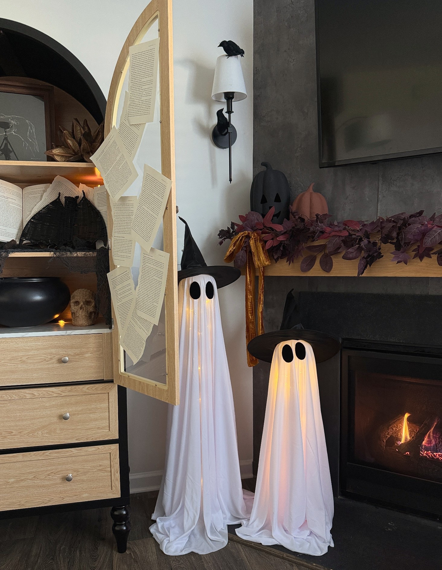 Garland, pumpkins & rattan bat under $12, Amazon ghosts under $25, and even the arched cabinet under $200!!
Halloween home decor, fall garland, Halloween fireplace, Falloween decor, Walmart decor, Amazon Halloween, arch cabinet

#LTKFallSale #LTKSeasonal #LTKHome