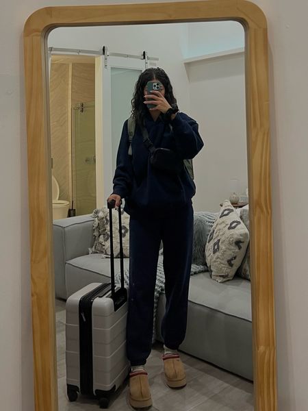 travel outfit !!

- navy blue set (aritzia)
- carry on roller suitcase - tan (target) 
- platform slippers (uggs)
- travel backpack (target) 
- crossbody (lululemon)