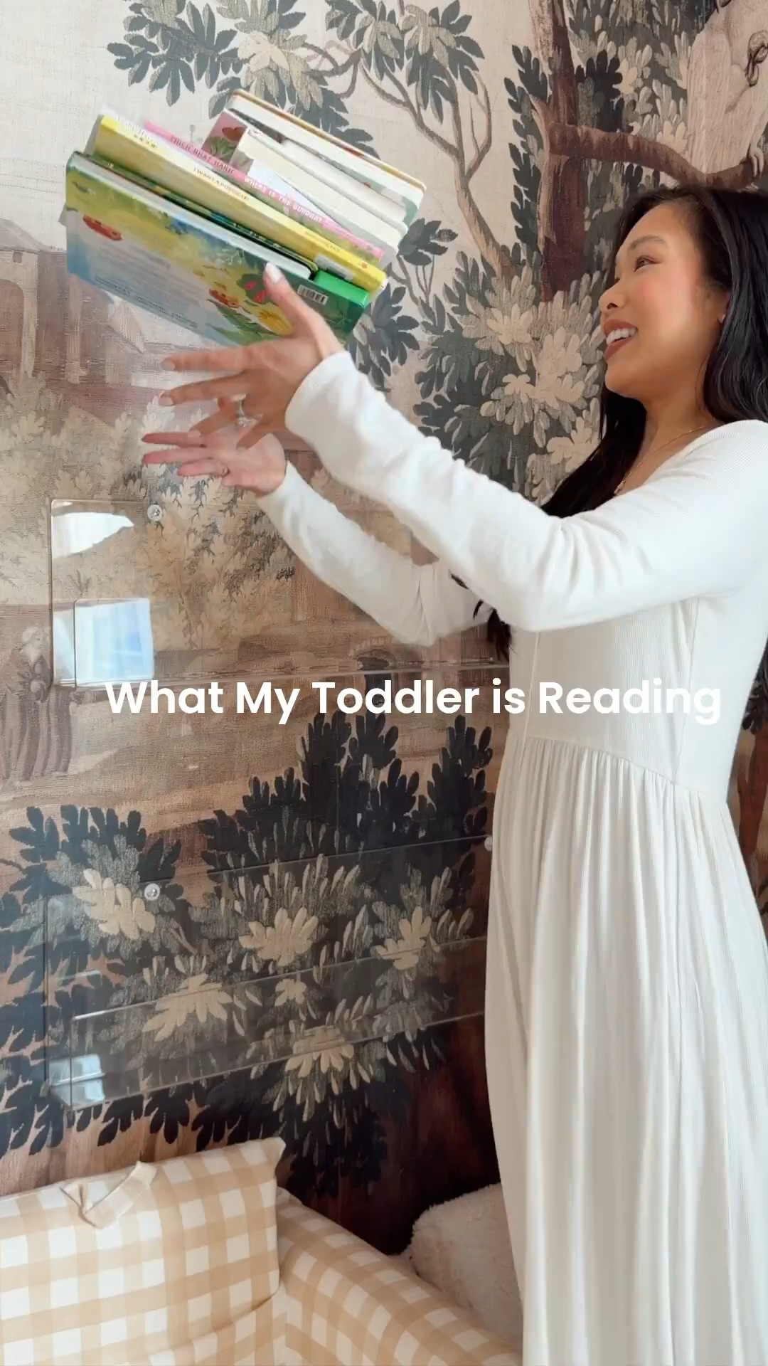 Toddler room decor with a mural on all four walls, clear bookshelves and the spring books she’s currently reading as part of our book rotation.

#LTKmomlife #LTKKids