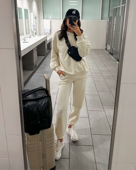 Travel outfit ✈️ This matching set is SO soft and comfy and the luggage & travel duffle are my favorites! Size small in sweatshirt, size small in sweatpants 



Airport outfit
Comfy outfit 
Casual outfit 
Errands outfit 
Athleisure outfit 
Loungewear 

#LTKfindsunder100 #LTKtravel #LTKstyletip