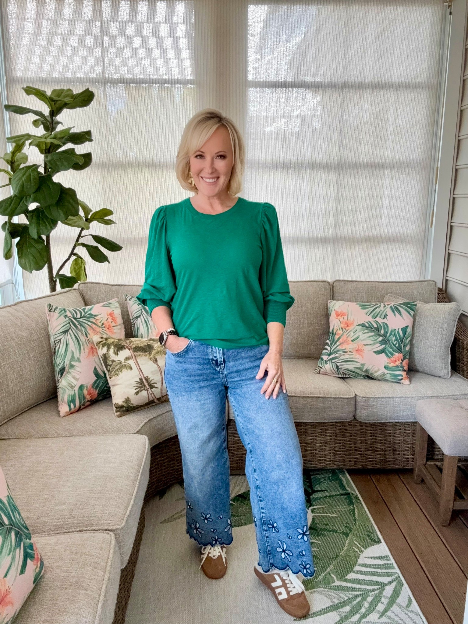 A little green moment for St. Patrick’s Day! ☘️ I’m wearing one of my favorite staple blouses by Nation Ltd. - it’s just as cute as it is comfy and I have it in so many colors! I paired it with my floral detail wide leg jeans from Amazon, mule sneakers from Anthropologie, and fun statement earrings from Amazon for an easy, put together outfit. Shop my look! 

#LTKootd #LTKPetite #LTKSeasonal