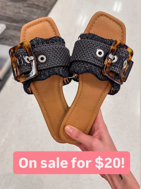 Black raffia sandals on sale at target! 

Target sandals // summer sandals // sandals with tortoiseshell buckle // raffia slide sandals // slip on sandals 

#LTKSaleAlert #LTKFindsUnder50 #LTKSeasonal
