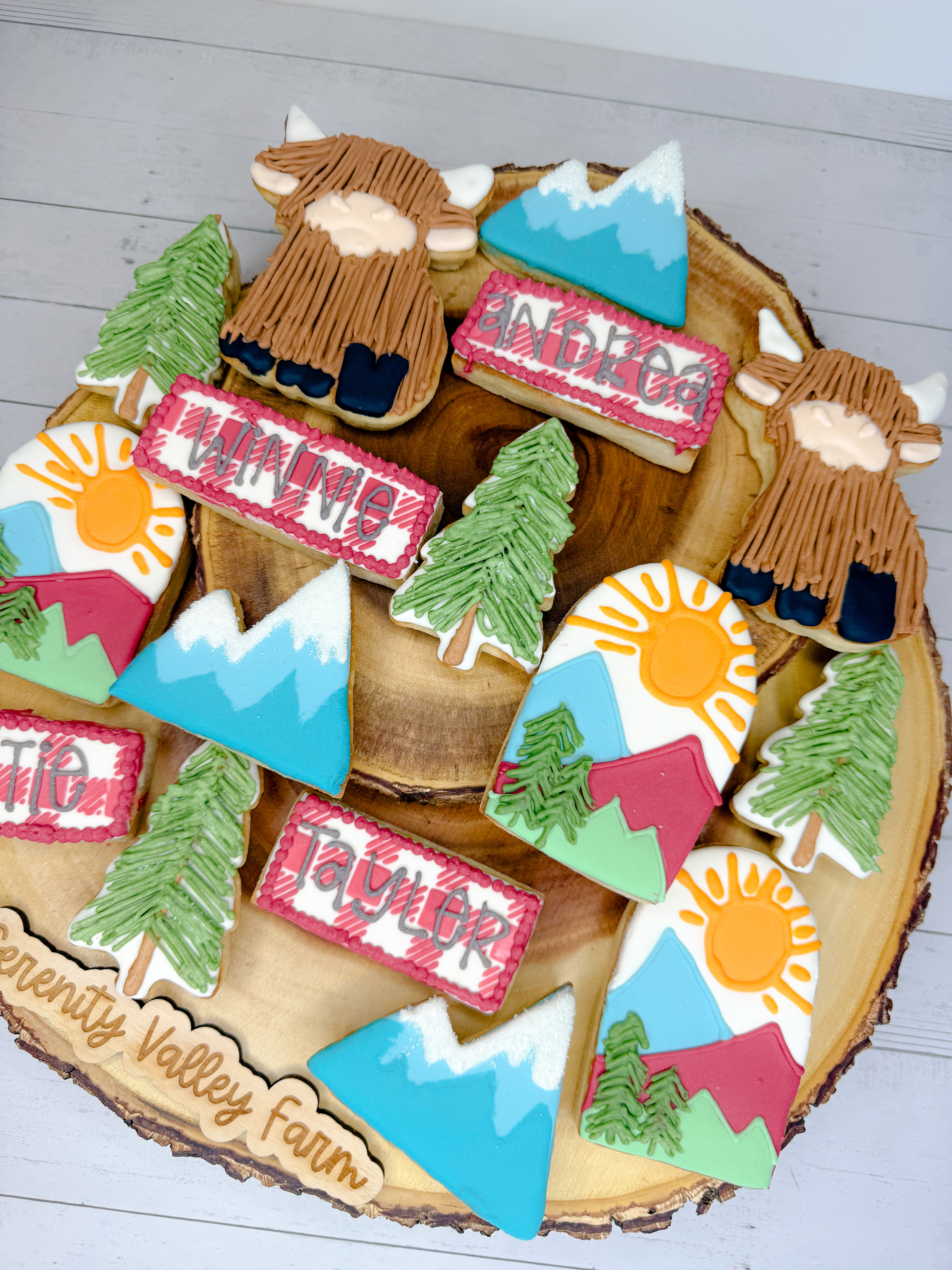 Adventure awaits! 🏕️🌲 These custom camp-themed sugar cookies feature mountains, pine trees, Highland cows, sunshine, and personalized name cookies for the perfect outdoor-inspired birthday celebration. Ideal for camping birthdays, mountain-themed parties, woodland birthdays, glamping parties, and nature-loving girls.

#CampBirthday #CampingParty #CustomCookies #DecoratedCookies #SugarCookies #RoyalIcingCookies #MountainBirthday #WoodlandParty #GlampingParty #HighlandCowCookies #BirthdayCookies #CustomDesserts #CookieArtist #OutdoorPartyIdeas #GirlsBirthdayParty #NatureInspired #CookieDecorating #PartyInspiration #BakeryLife #LTKFinds 

 #LTKdayinmylife #LTKfoodie #LTKHome