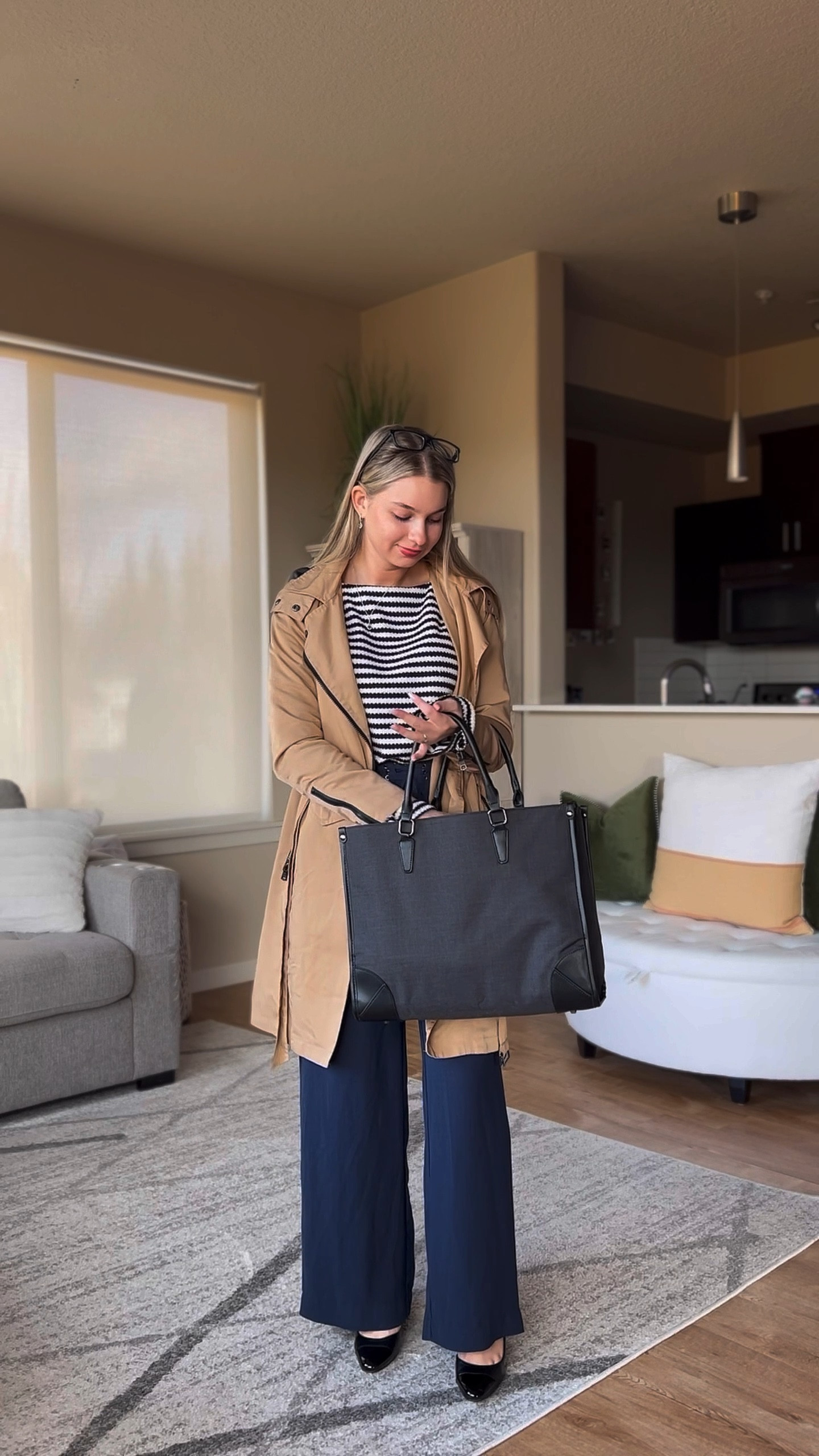 My go to work outfit. I work in marketing so for me it is important to be comfortable since I will be sitting at my computer most of the day. My bag is the most important. I need a bag that can carry all of my belongings and also that it is cute to go with my outfit. Lastly a rain coat because I live in Oregon where it is rainy. 

#LTKVideo #LTKfindsunder50 #LTKworkwear