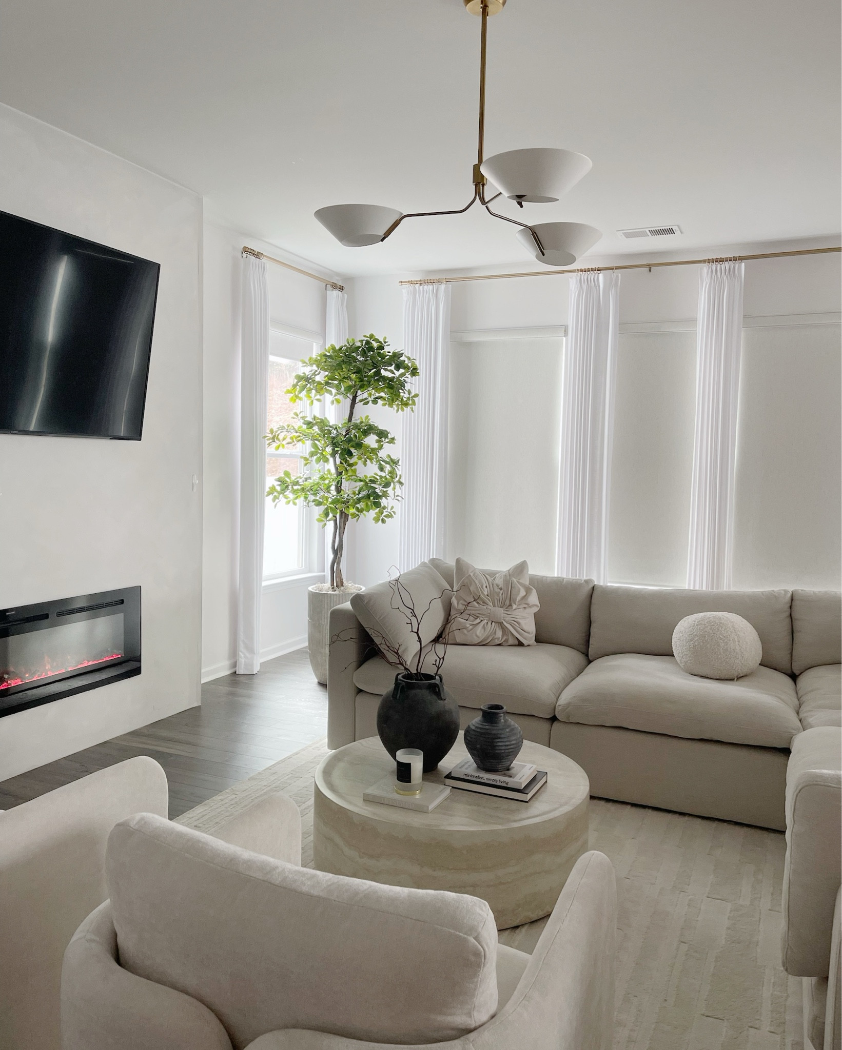 Neutral living room decor for winter 
The Roman shades are from Two Pages. Don’t forget to use the discount code: JEANNY 

#LTKSeasonal #LTKFindsUnder50 #LTKHome