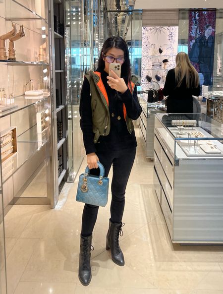 Found this beauty at the Dior boutique in London Heathrow! Whenever I connect through Heathrow, I make sure I have at least a 3 hour layover. Why? So I can calmly transfer to my terminal and/or walk to my gate & visit all the luxury boutiques! For my travel look, I wore my black leggings with a hoodie, combat boots and a puffer vest! 

#LTKshoecrush #LTKtravel #LTKitbag