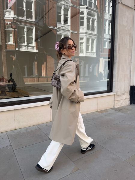 Trench coat, white jeans, white t-shirt, suede trainers, sunglasses, scrunchie, leather shoulder bag

#LTKstyletip #LTKeurope #LTKSeasonal