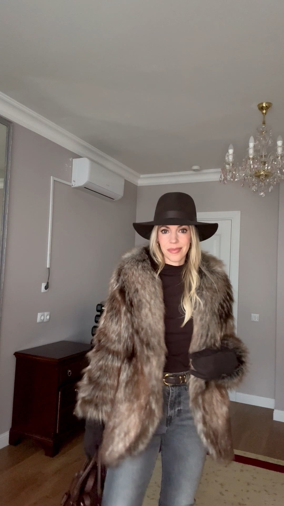 Faux fur fox coat, dark brown wool hat, Levi’s gray slim straight jeans, chocolate brown kitten heel boots, long brown suede gloves, brown and gray winter outfit 

#LTKootd #LTKFindsUnder100 #LTKOver40