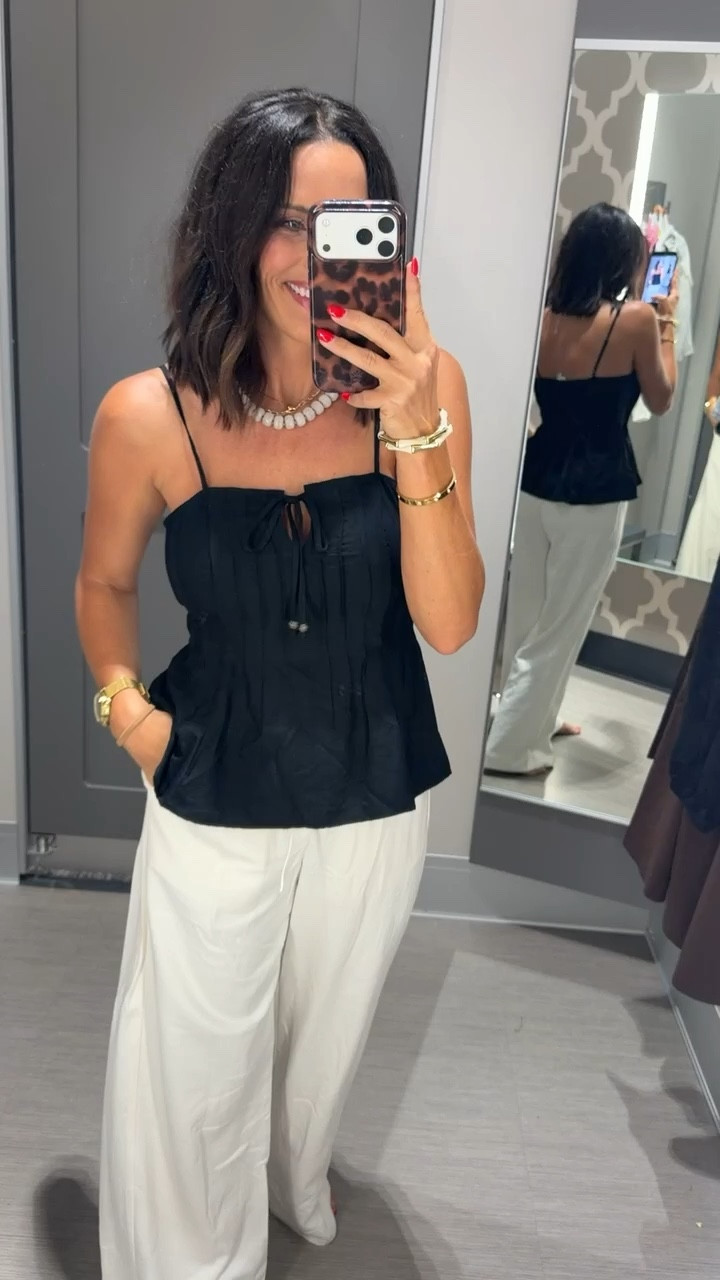 Target is seriously winning lately. 🖤 This top is on sale, gives expensive boutique vibes, and is one of those pieces that goes with everything.

Wearing a Small • 5’3” for reference