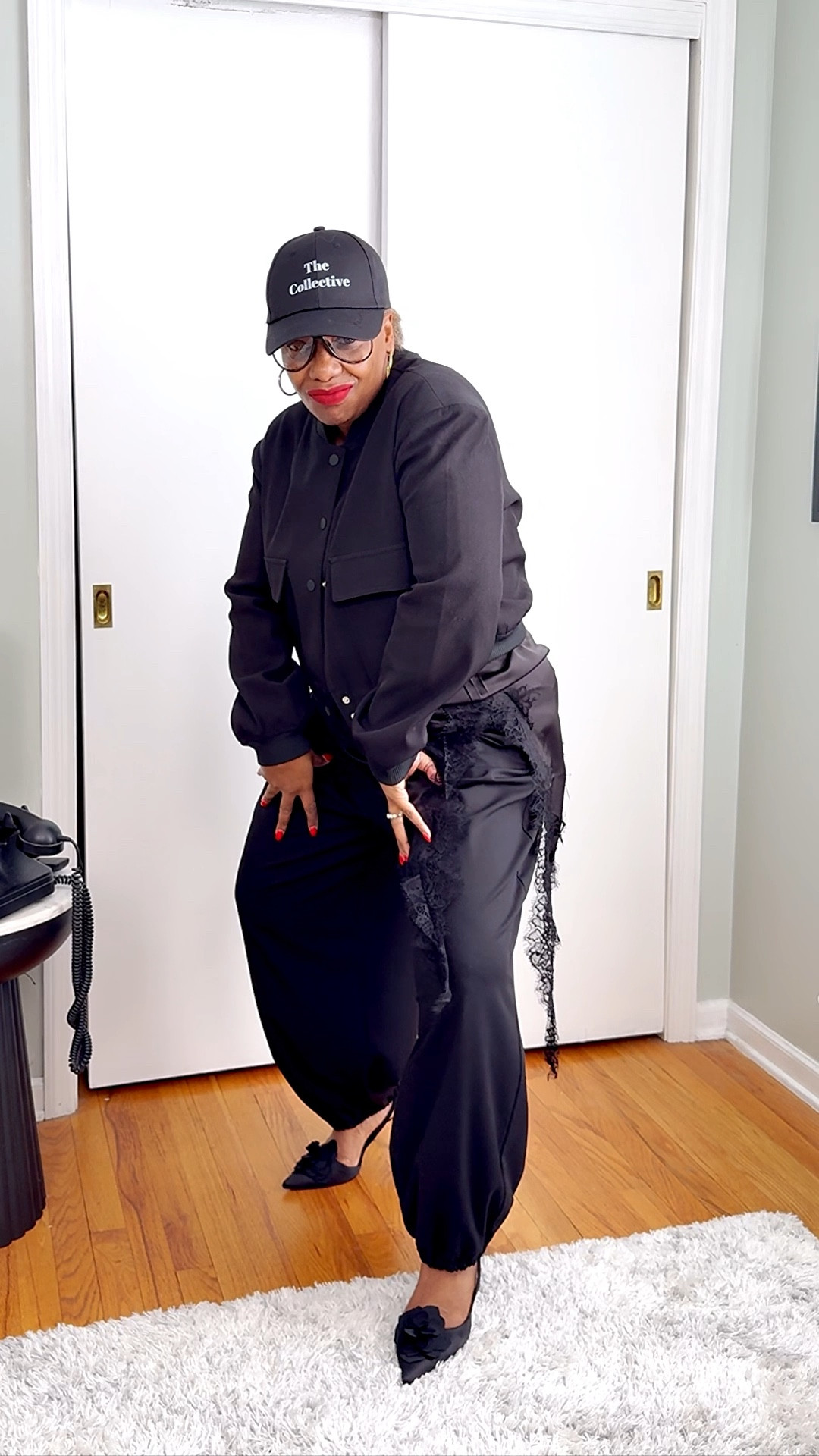 All Black, Elevated
Black structured jacket over a lace camisole with relaxed black pants and pointed flats. Styled with a cap and red lip for contrast. An easy all-black formula that always feels put together.
#AllBlackOutfit #minimalstyle #EverydayChic #LayeredLook #Over40Style

#LTKOver40 #LTKootd #LTKMidsize