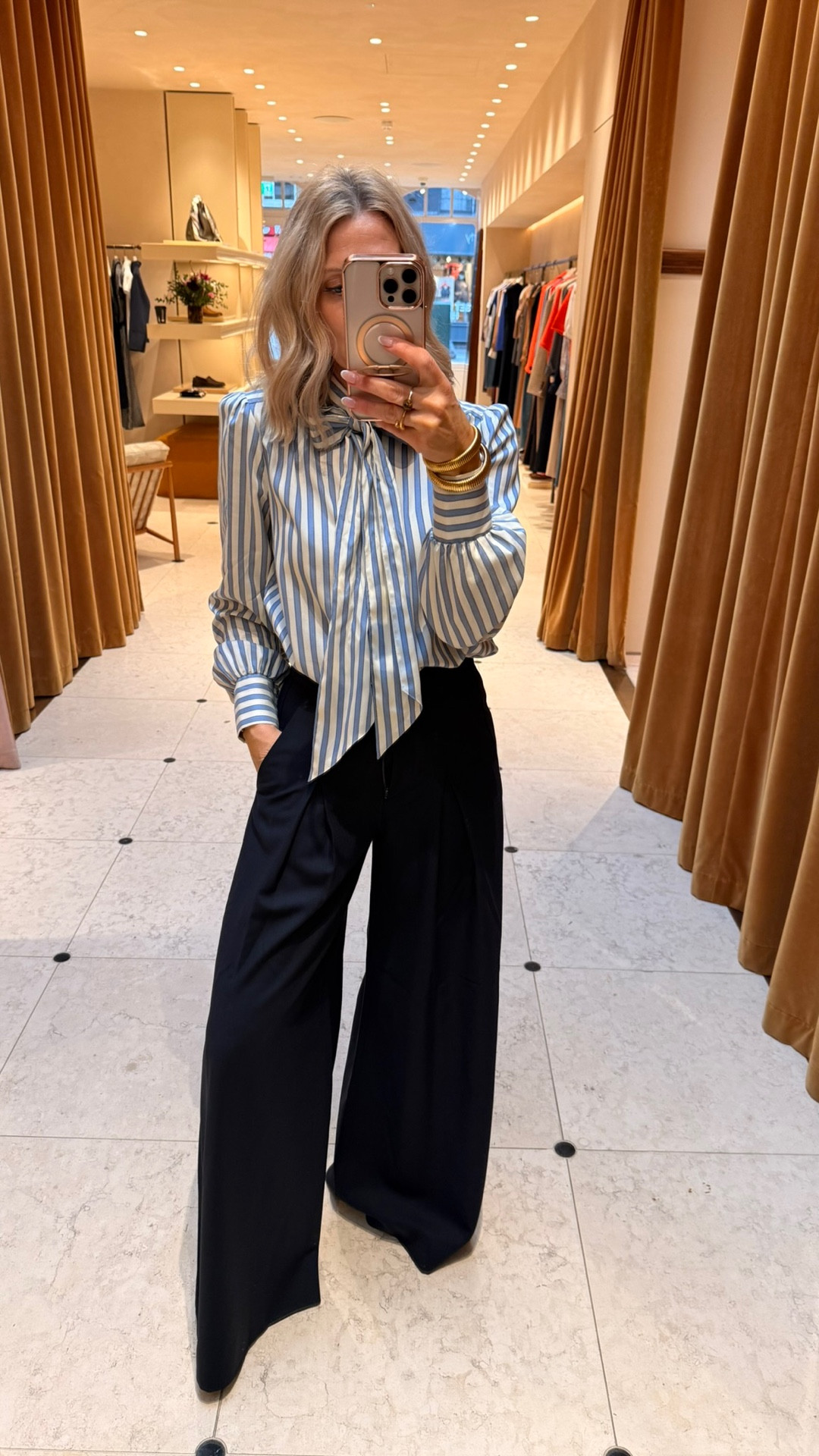 Never underestimate the power of a really well-cut pair of trousers. The cut on these is doing ALL the work for me.

All I’ve done is add a simple white boxy top, pop on my jewellery,  because let’s face it, you’re never quite complete without it - and you’re good to go.

This is exactly what I mean when I say the outfit should be doing the work for you, not the other way around.

When the proportions are right, you don’t need lots of fuss…just a few good pieces that balance your shape beautifully.

#LTKuk #LTKspring #LTKstyletip