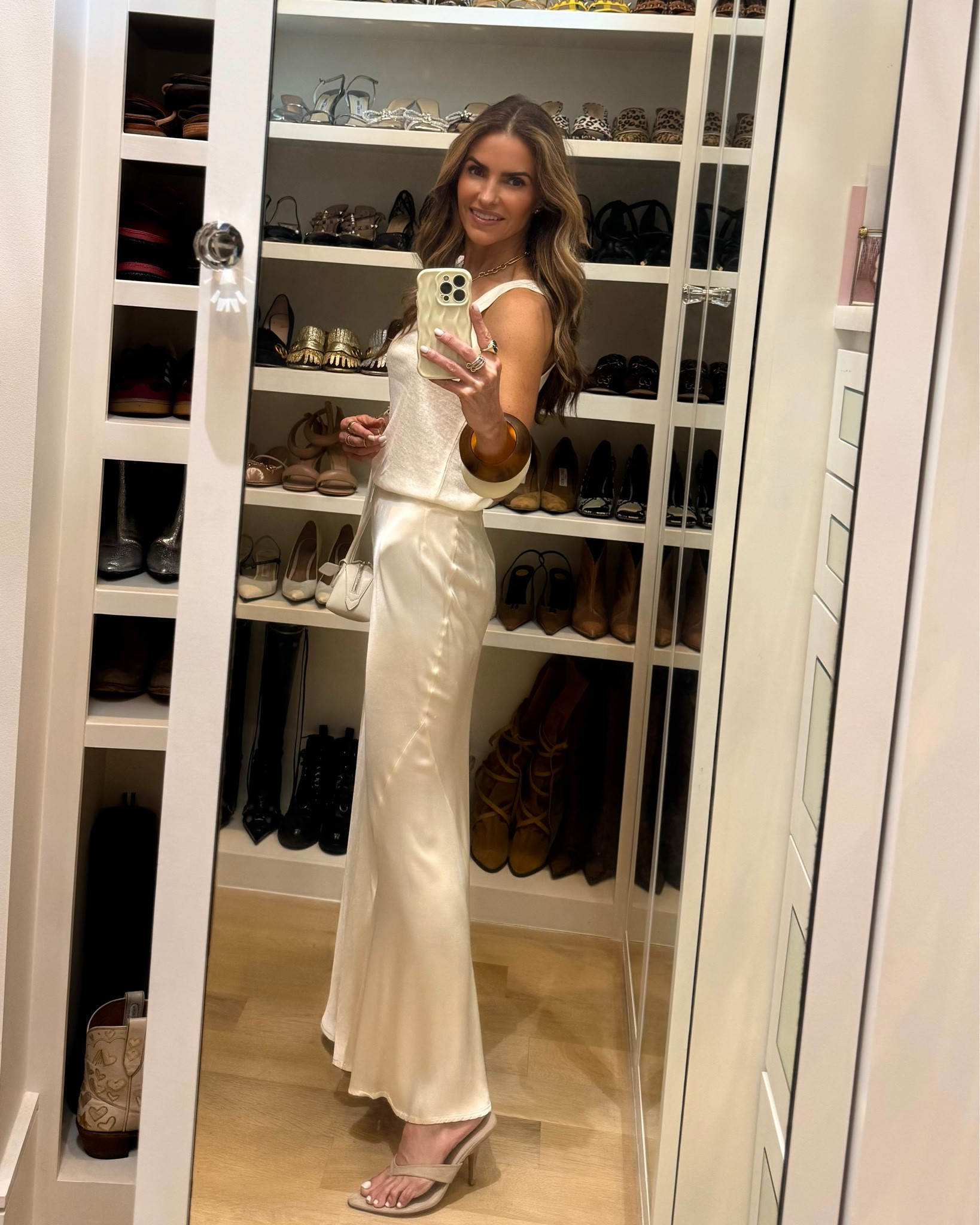 celebrating p’s bday wearing a go-to summer chic look for all: beautiful linen tank (that’s <$70), silk skirt & comfy, heeled thongs

bc we’re celebrating p’s bday today at @lepassagedallas 

tank tts wearing small & skirt i can wear the 2 or 4 tts also 


#LTKSummerEdit #LTKWedding #LTKFindsUnder100