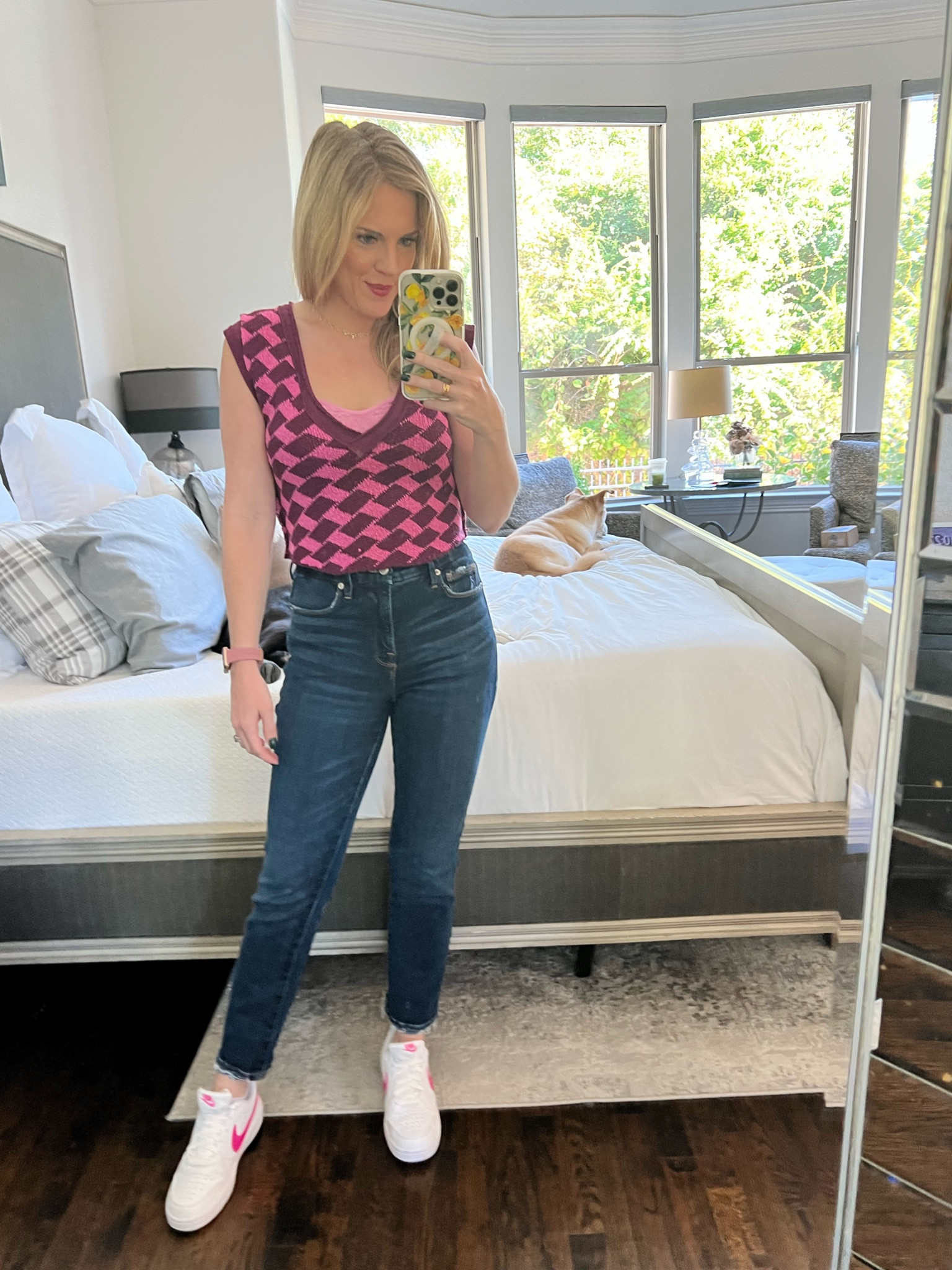 Free people tank 
Good American straight leg jeans 
White Nike court visions 
Sweater tank 
Argyle print 

#LTKFindsUnder100 #LTKSaleAlert #LTKFindsUnder50