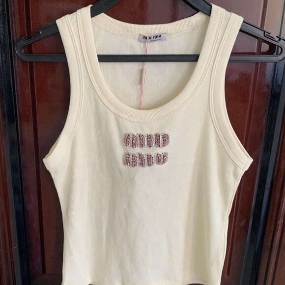 Women's miu miu apricot sleeveless vest | Poshmark