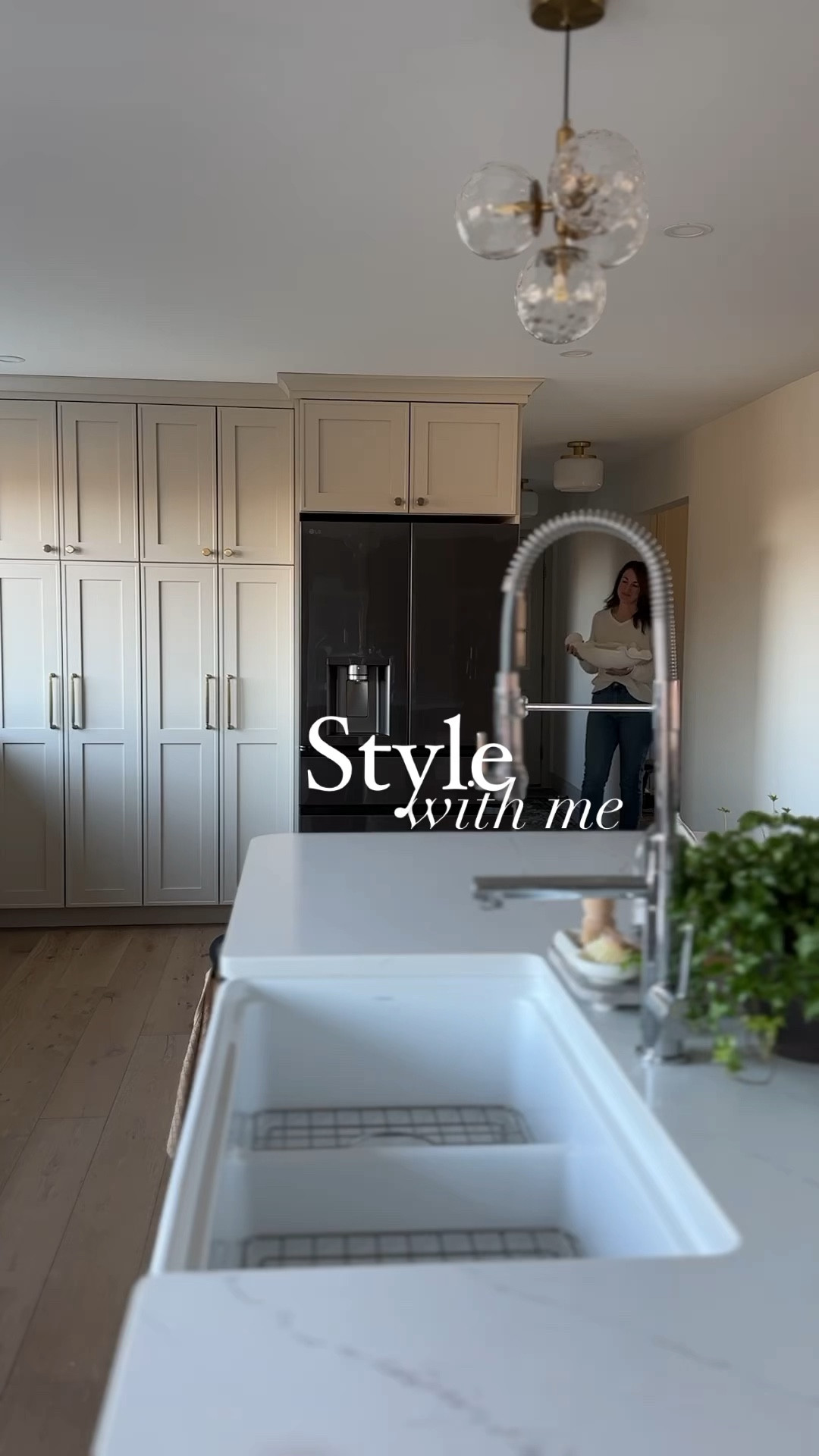 Come style with me using these beautiful designer pieces from @kathykuohome. #ad I am so excited to share my dream coffee table with you. 

I actually planned it for the new living room addition, but for now it also fits perfectly into our family room space. I received this stunning and uniquely shaped bowl and knew it was just begging for a plant in it. 

I always love turning items like this into a planter because plants help elevate the design even further for a perfectly unique look. And here’s a no-fail method for coffee table styling:
Add a plant
Prop open a beautiful coffee table book to a pretty page
Set a piece of pottery in the final corner to create a scalene triangle

I also added these beautiful olive stems to the bookshelf for a more springy feel. You can shop all these beautiful Kathy Kuo Home pieces via my LTK page. #lovewhereyoulive 


#LTKhome #LTKSeasonal #LTKstyletip