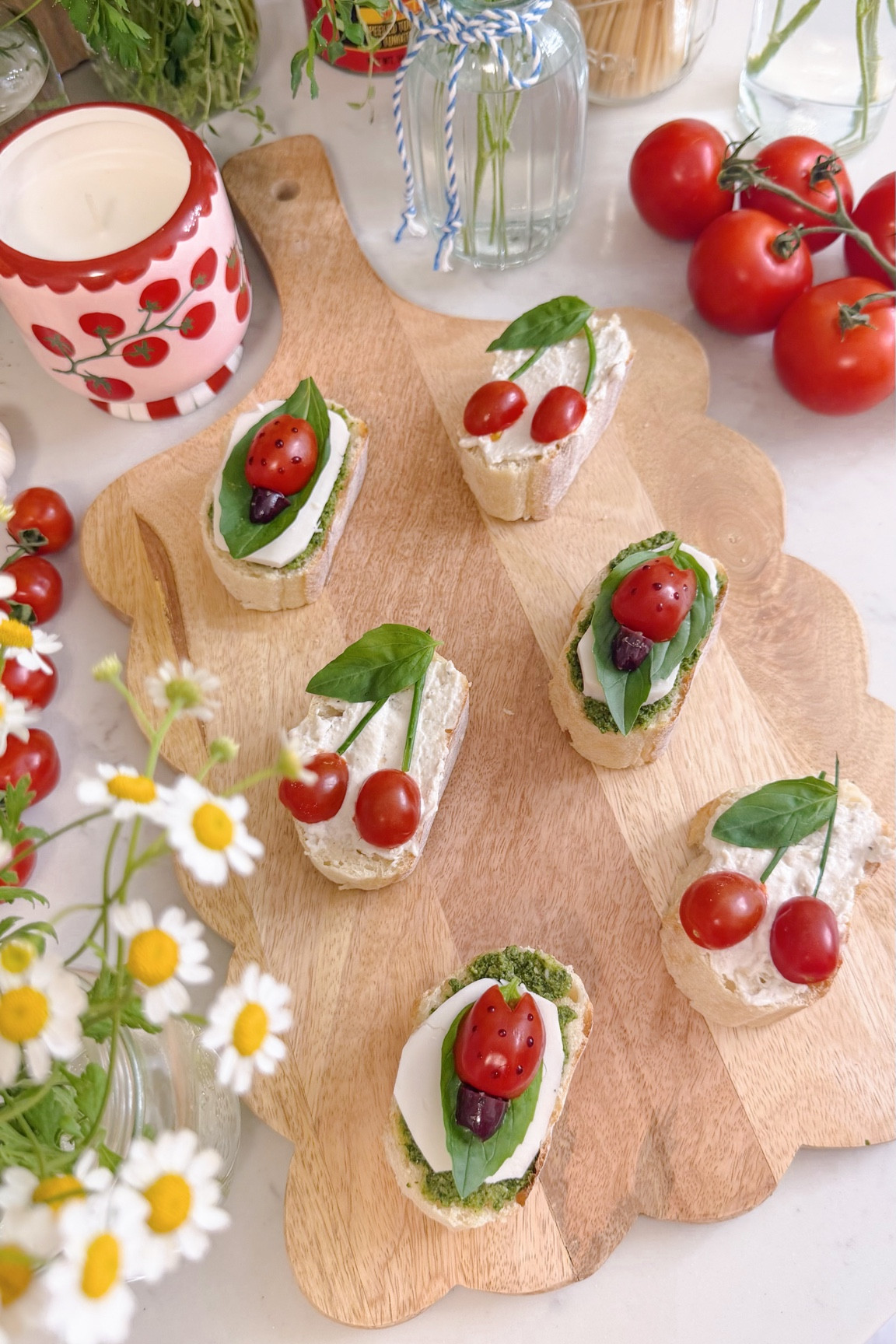 make the cutest ladybug & cherry tomato bruschetta 🍅🍒🐞 if you’re hosting a little spring soirée, this easy & adorable idea is perfect to serve your guests 👩🏼‍🍳✨

I made cherry + ladybug toasts using fresh cherry tomatoes, vegan ricotta & mozzarella, pesto, olives, balsamic glaze & basil, and I’m obsessed with how it turned out. such a simple way to make your table feel extra special 🧺💕 

save this for your next spring hosting inspo 🎀✨

#fooddesign #eatpretty #bruschettas #springhosting #pinterestinspo 

#LTKHome #LTKSeasonal