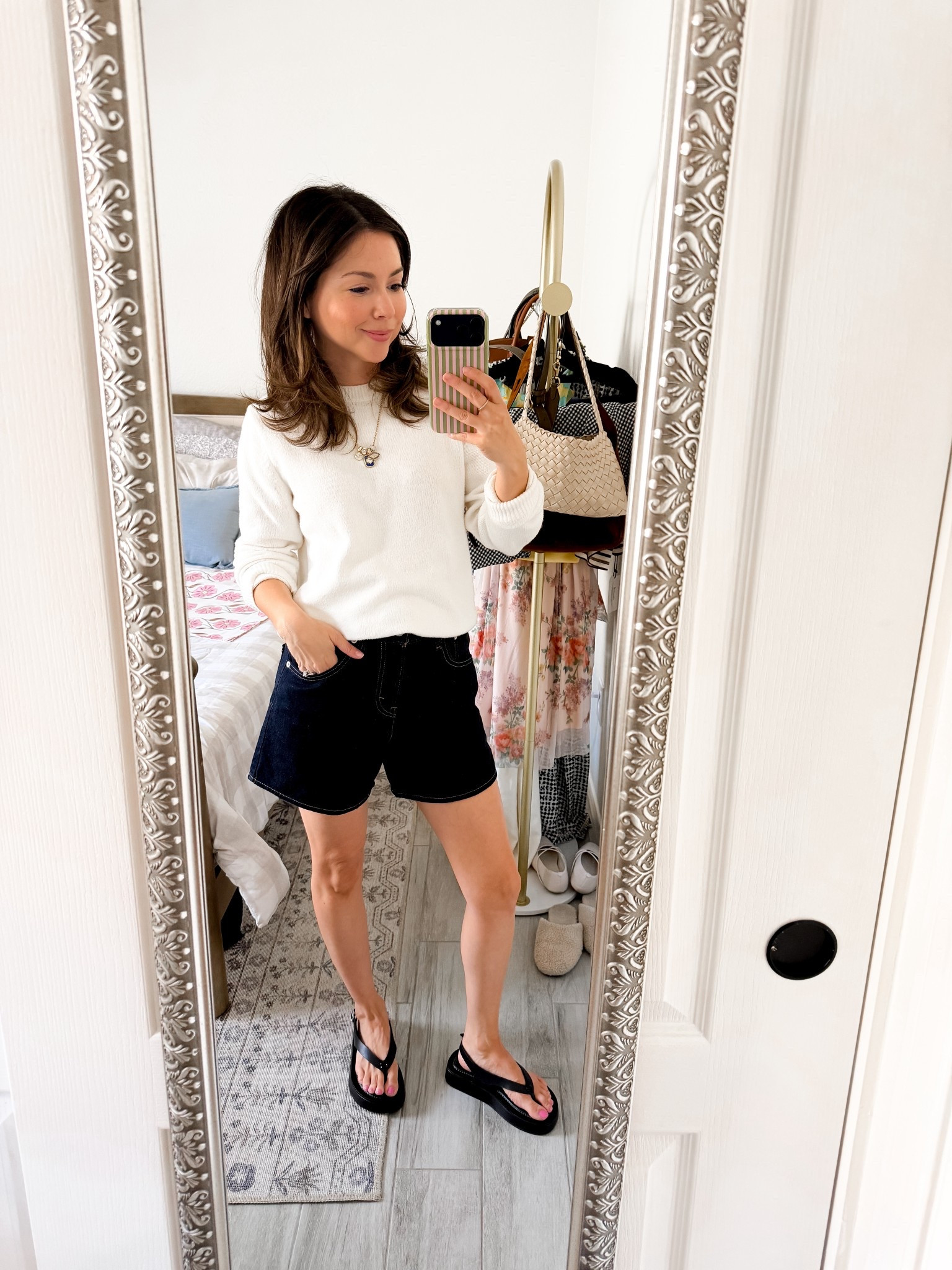 This is one of those 5’2 petite-friendly outfits that just works every time. The slightly oversized cream sweater balances the structured dark denim shorts, and the platform flip flops give me a little height without sacrificing comfort.

I love pieces like this because they mix effortlessly — the sweater works with jeans, trousers, or over a dress, and these shorts are the perfect not-too-short length for everyday mom life. Easy, polished, and zero overthinking required.

Shorts 25 @levi 

#LTKootd #LTKPetite