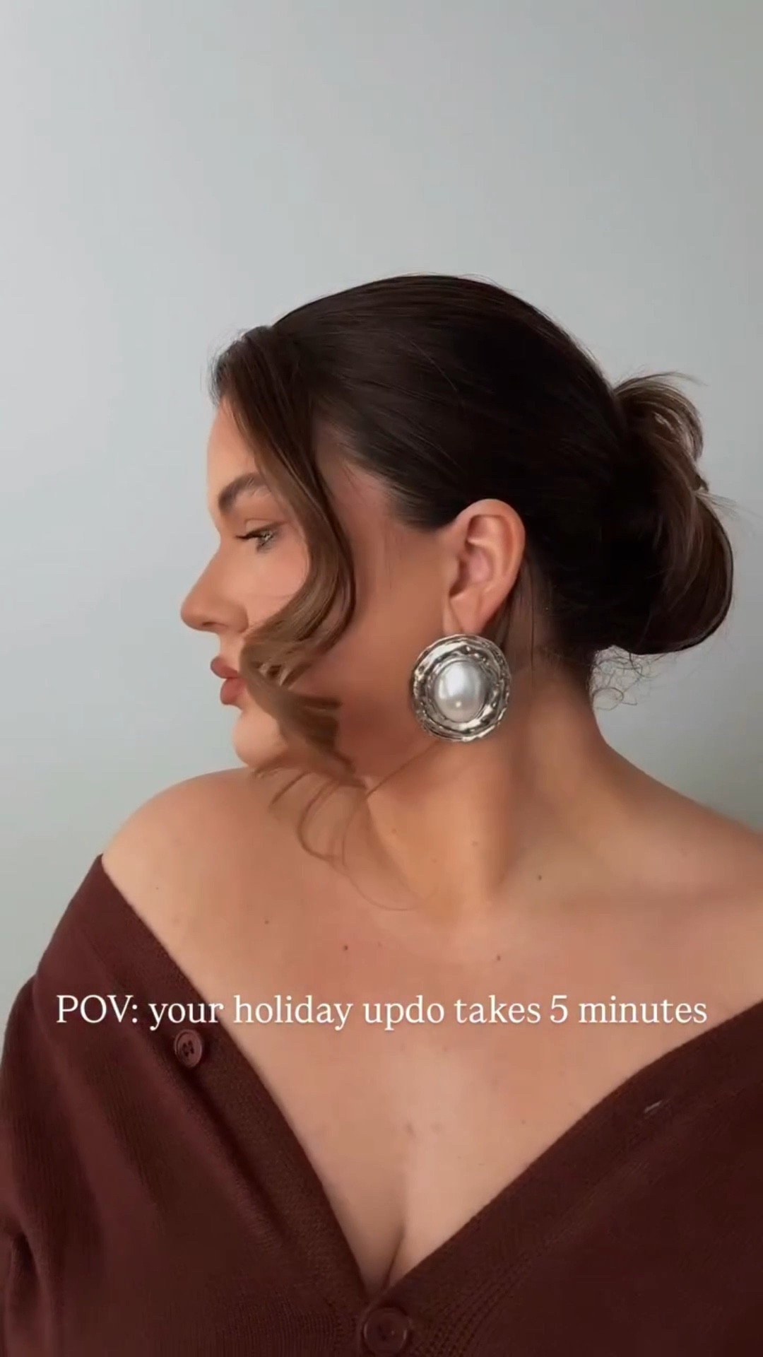 Yall this updo is sooooo easy for all of your holiday events/holiday parties. It took me 5 minutes! 

1. Part hair where you want it
2. Section out one front face framing section (or you can skip this step if you don’t want hair down in any way)
3. Pull hair into a mid to low ponytail 
4. Separate ponytail into 2 sections
5. Twist the 2 ponytail sections together 
6. Wrap the twist in a circle formation like you would wrap a regular bun. You can keep the twist snug or you can let it kind of loosen up if you want it to look fuller like mine
7. Pin the bun
8. Extras: secure flyaways and baby hairs (I also covered up some greys that are already showing…like girl you need to calm doooown I just got you done!) 
9. If you left a piece out of the pony, curl with a curling iron (I pinned mine for a minute to help the shape hold)
10. Voila! The perfect low effort updo 

#hairtutorial #updo #holidayhairstyle