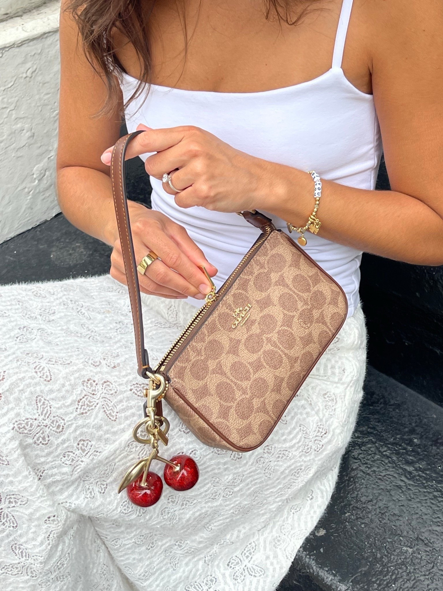 [3/23/26] quick city day trip 🚕 linking this adorable coach bag + charm 

#LTKgrwm #LTKootd #LTKdayinmylife