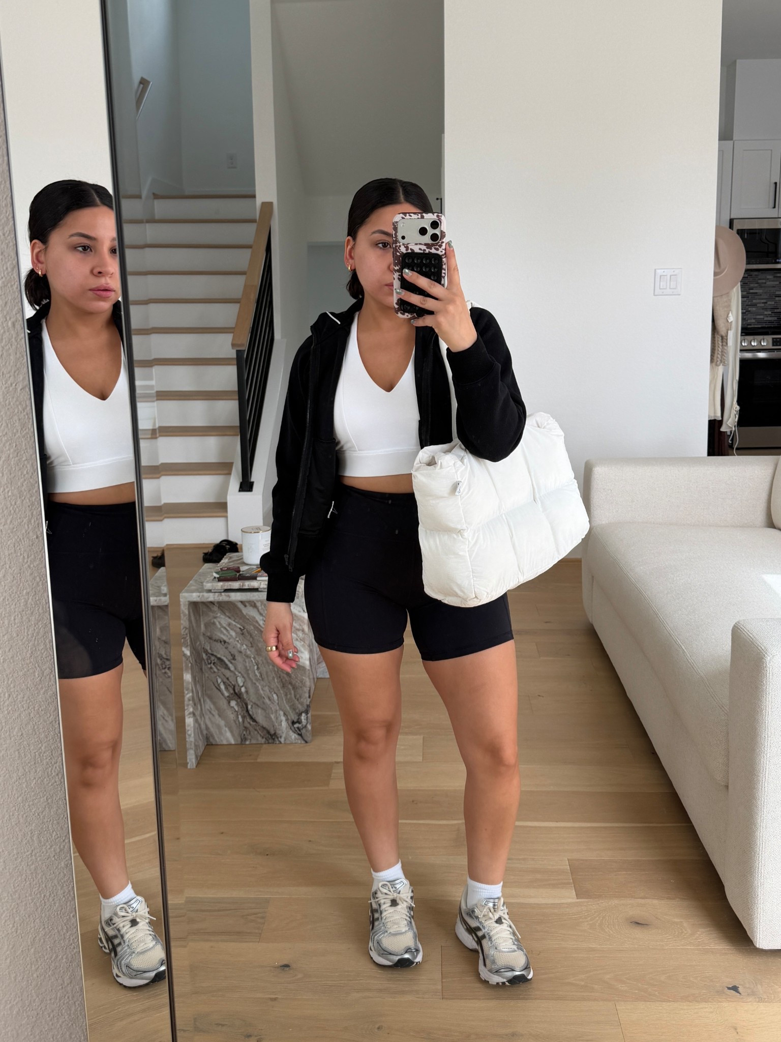 Biker shorts: small
White sports bra: small
Black zip up jacket: xs 
sneakers: 6.5 women 
White ankle socks 
Puffer tote bag 

#LTKSpringSale #LTKActive #LTKootd