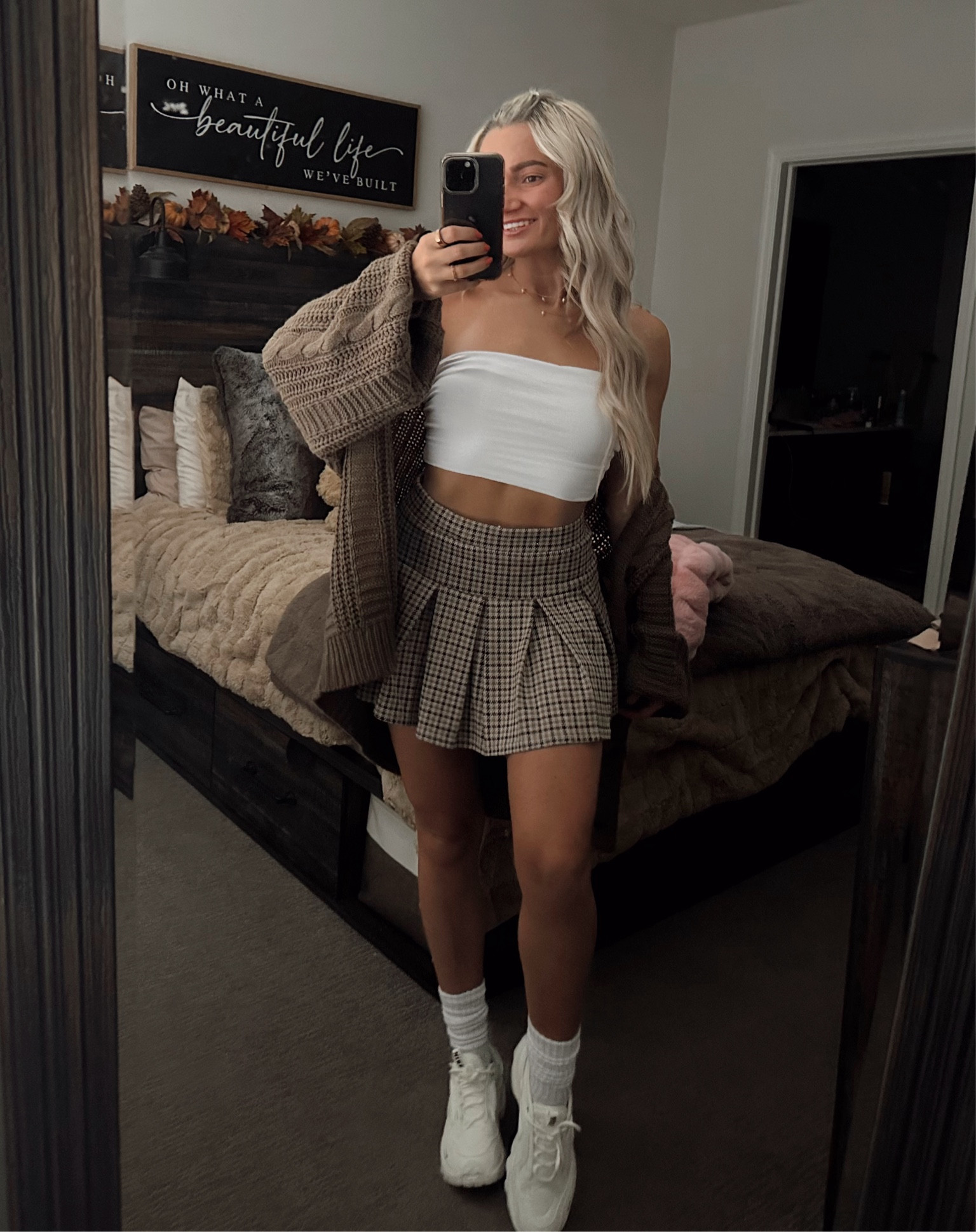 I’m 5’4 and 135 lbs wearing a small cardigan and an XS skort 🤎👟☕️ Bandeau is from fashion nova 