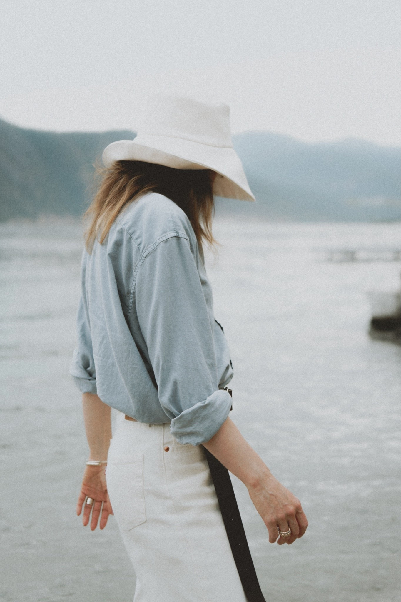 Canvas hat & belt: @Janessa Leone 
White straight leg jeans: @Levi's 
Styled with a blue oversized button down shirt.

#LTKSeasonal #LTKWorkwear #LTKootd