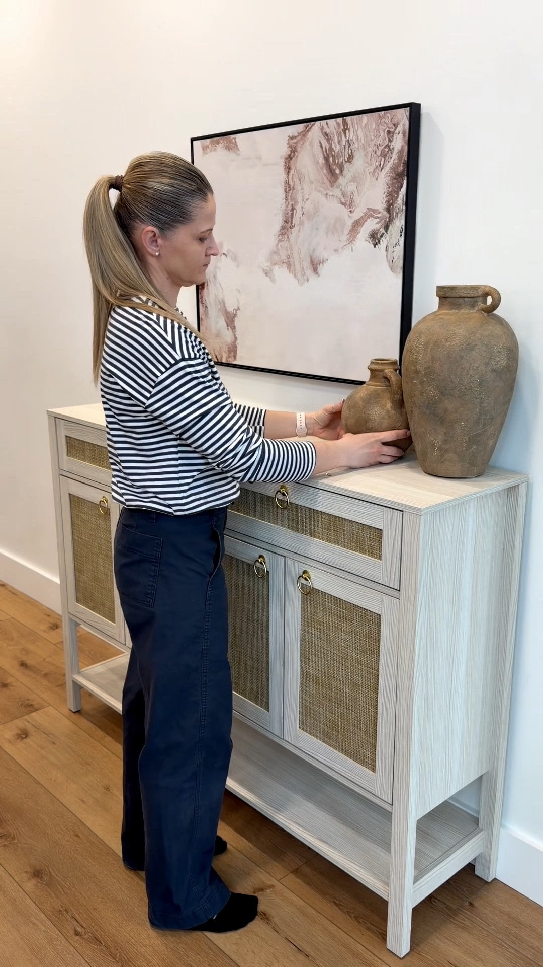 A simple sideboard moment 🤍
The hidden storage makes it even better.

🔗Comment SIDEBOARD and I’ll send you the link!

#sideboardstyling #neutralhome #modernfarmhousestyle #entrywaydecor #homedetails

#LTKHome #LTKSaleAlert #LTKSeasonal