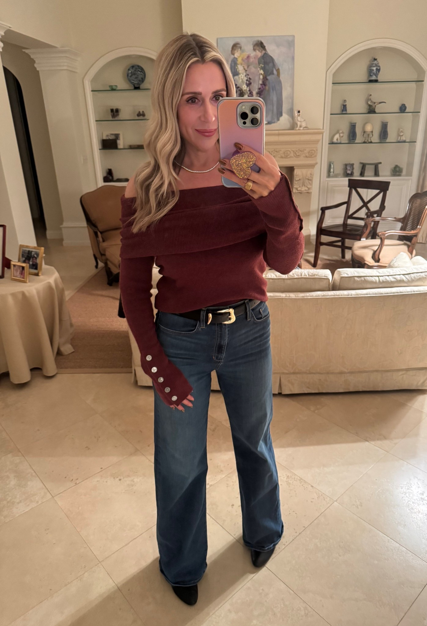 Night out with my Stockton ladies 🙏🏻 Couldn’t find this sweater in this color anymore but linked it in other colors . So soft and comfy and perfect for winter . Paired with one of my favorite pairs of denim that have stretch and are the perfect wide leg. I sized down in these and am wearing a 27! Belt is Amazon and under $20! 

#LTKSeasonal #LTKFindsUnder50 #LTKOver40