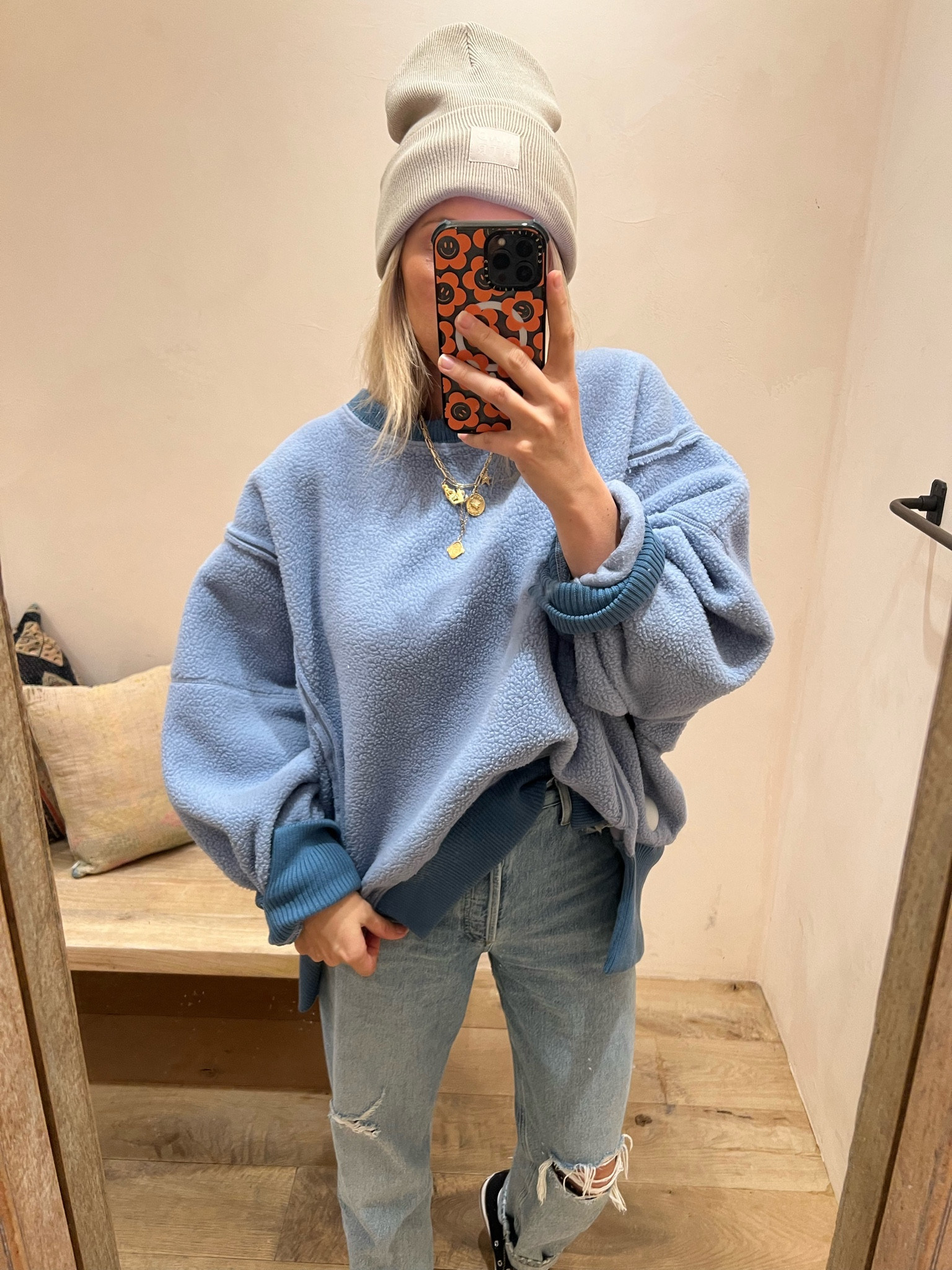 Runs oversized- wearing a medium but would size down 