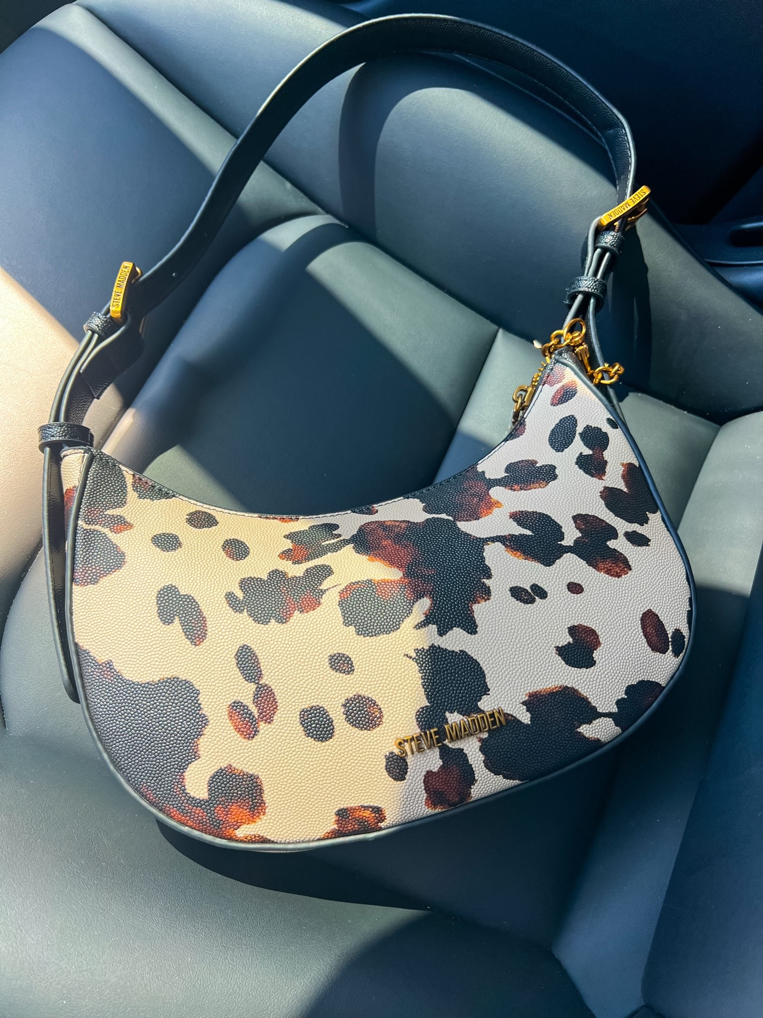 Styled this cute cow print @stevemadden-us bag for brunch today! 😍

#LTKootd