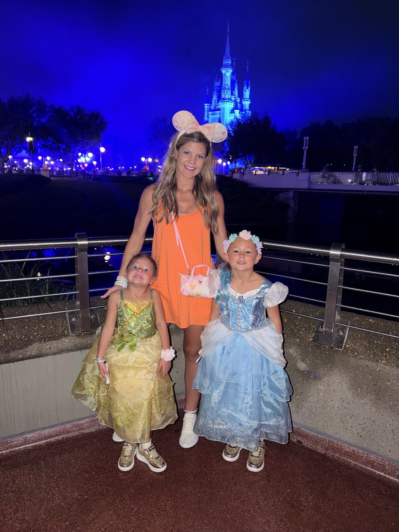 Orange romper dress. Orange dress. Free people dupe. Disney outfit. Disney fit. Magic kingdom outfit.