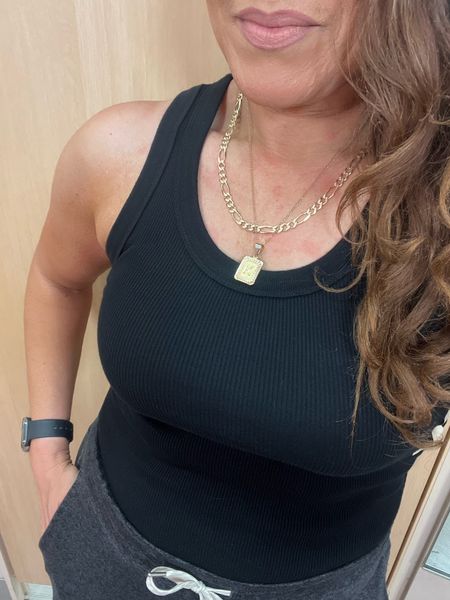 I love the fit and structure of this classic ribbed tank top. It’s only $10! A must have basic in your closet year round! I’m wearing a small. I picked this up in black and white. Target style, mom style, Summer outfit, #LaidbackLuxeLife

Tank top: S
Joggers: S Long

Follow me for more fashion finds, beauty faves, lifestyle, home decor, sales and more! So glad you’re here!! XO, Karma

#LTKFindsUnder50 #LTKSeasonal #LTKStyleTip