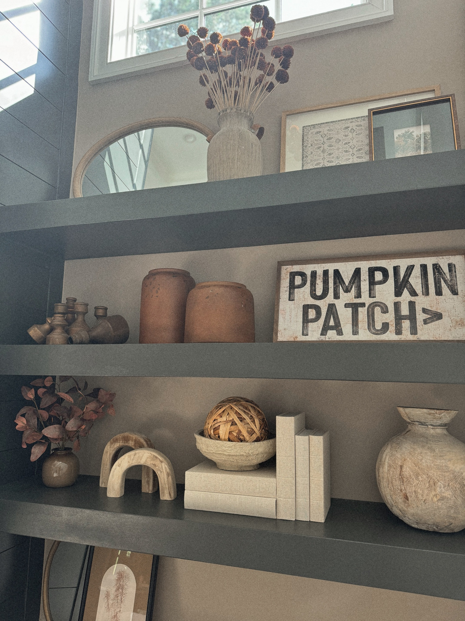 Fall decor has begun on the built ins🤎🍂🙌🏽🎃 gimme all the cozy, warm & neutrals! Linked everything I could! A few finishing touches still to come but — I couldn’t wait to show you! 

Things not linked 👇🏼
*top left mirror is old from Kirklands, top rustic vase is Home Goods, top right print is Kirklands!*

*middle shelf burnt orange vases are old from Target, basket weave ball is old from Kirklands*

Home / fall decorating / neutrals / cozy home / target / amazon / inspo / home design / style / autumn / shelf inspo / Holley Gabrielle / fall home / modern / vintage 

#LTKSeasonal #LTKStyleTip #LTKHome