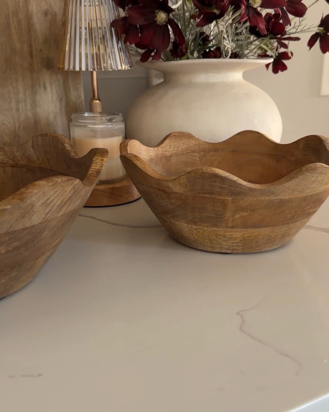 These wooden bowls add an organic touch to my kitchen. Perfect for serving snacks or desserts, holding fruit or vegetables, or stacking on your shelves for decor. Loving the natural grain texture!

#LTKHome