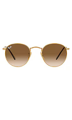 Ray-Ban Round Metal in Gold from Revolve.com | Revolve Clothing (Global)