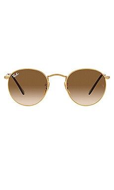 Ray-Ban Round Metal in Gold from Revolve.com | Revolve Clothing (Global)