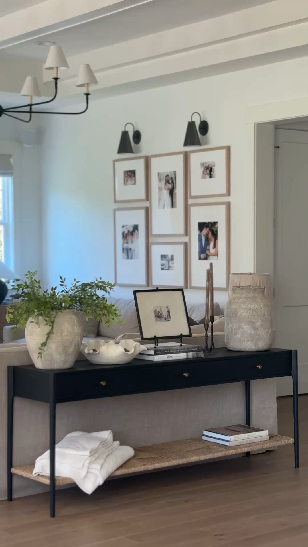 This little console setup might be one of my favorite “quiet luxury” moments in our home 🤍

Layering neutrals + mixing textures is everything here—ceramics, wood, linen, glass—so it feels collected, not staged. And a photo grid above instantly makes it feel personal (without overthinking it).

Proof you don’t need a huge space to create a moment that feels designer ✨

Everything linked—console, decor, frames & more. 

 #LTKHome
